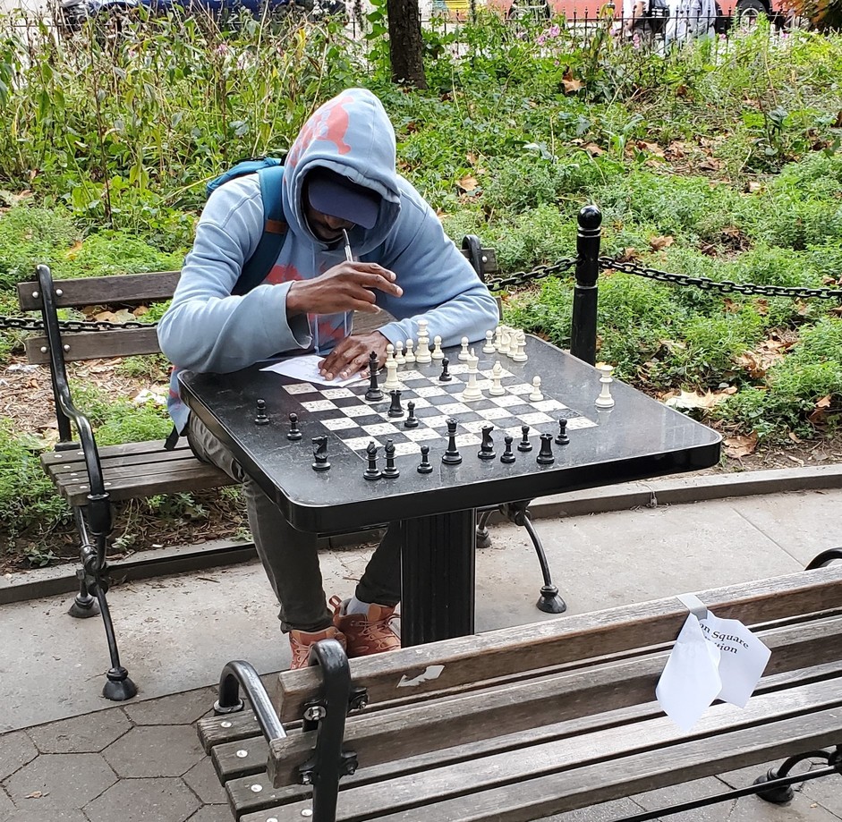 Kickboxer likes to frequent parks to play chess games and stare